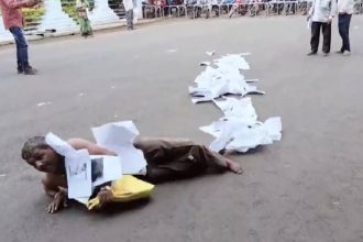 Slippers on head, papers as garland: Watch Madhya Pradesh man’s desperate plea for justice