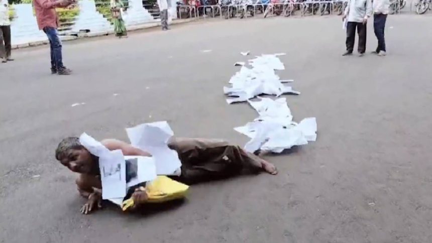 Slippers on head, papers as garland: Watch Madhya Pradesh man’s desperate plea for justice